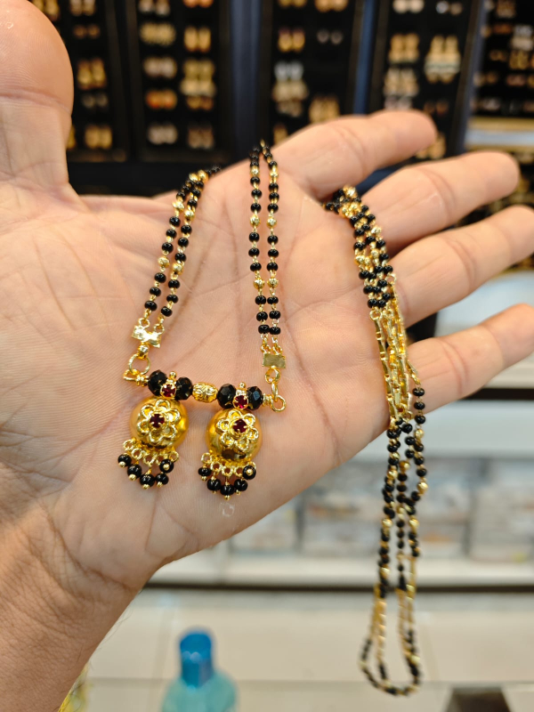Panchaloha gold polish kari mani mangalya chain set.