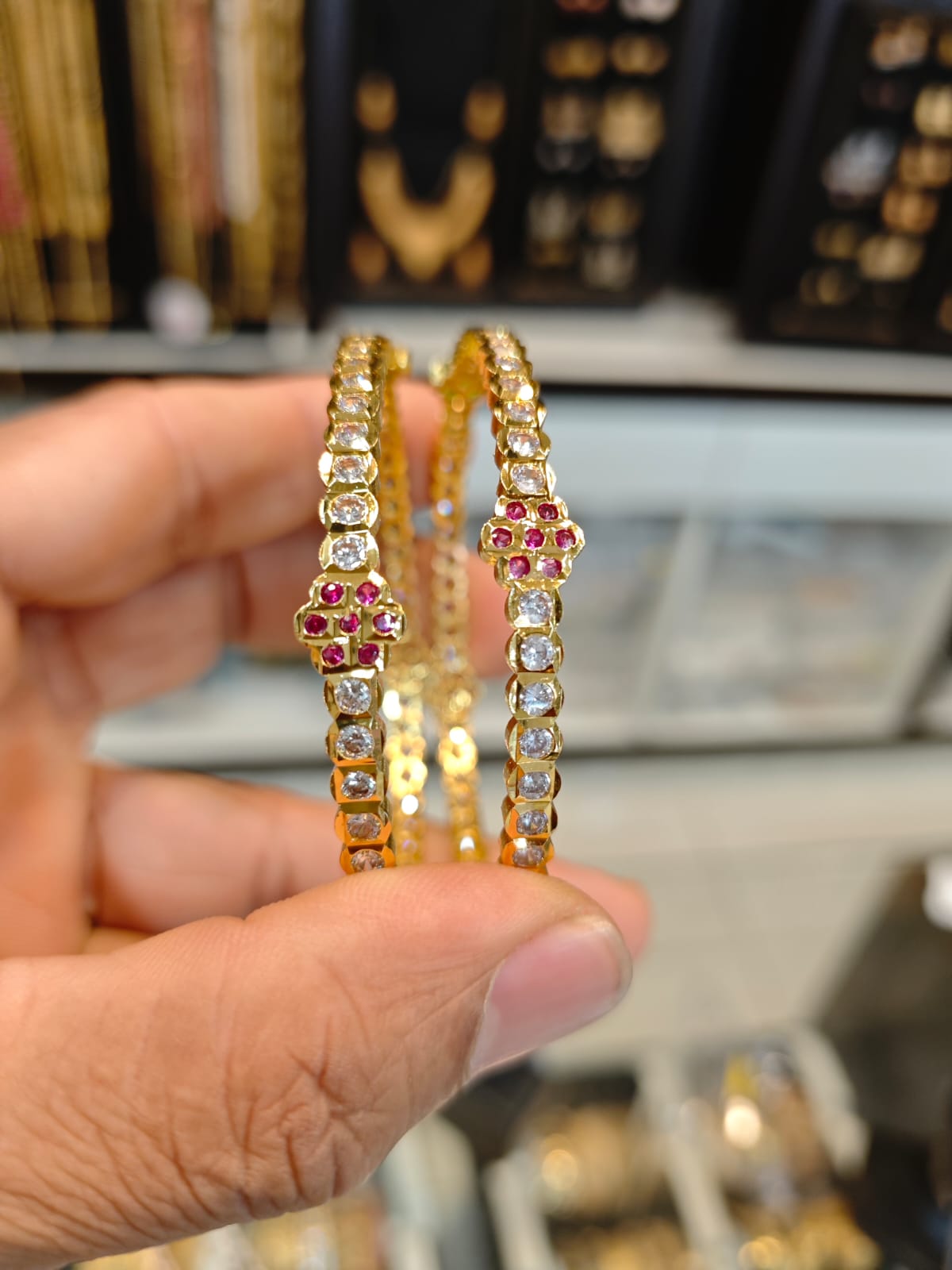 Gatti gold polish pair bangles set.