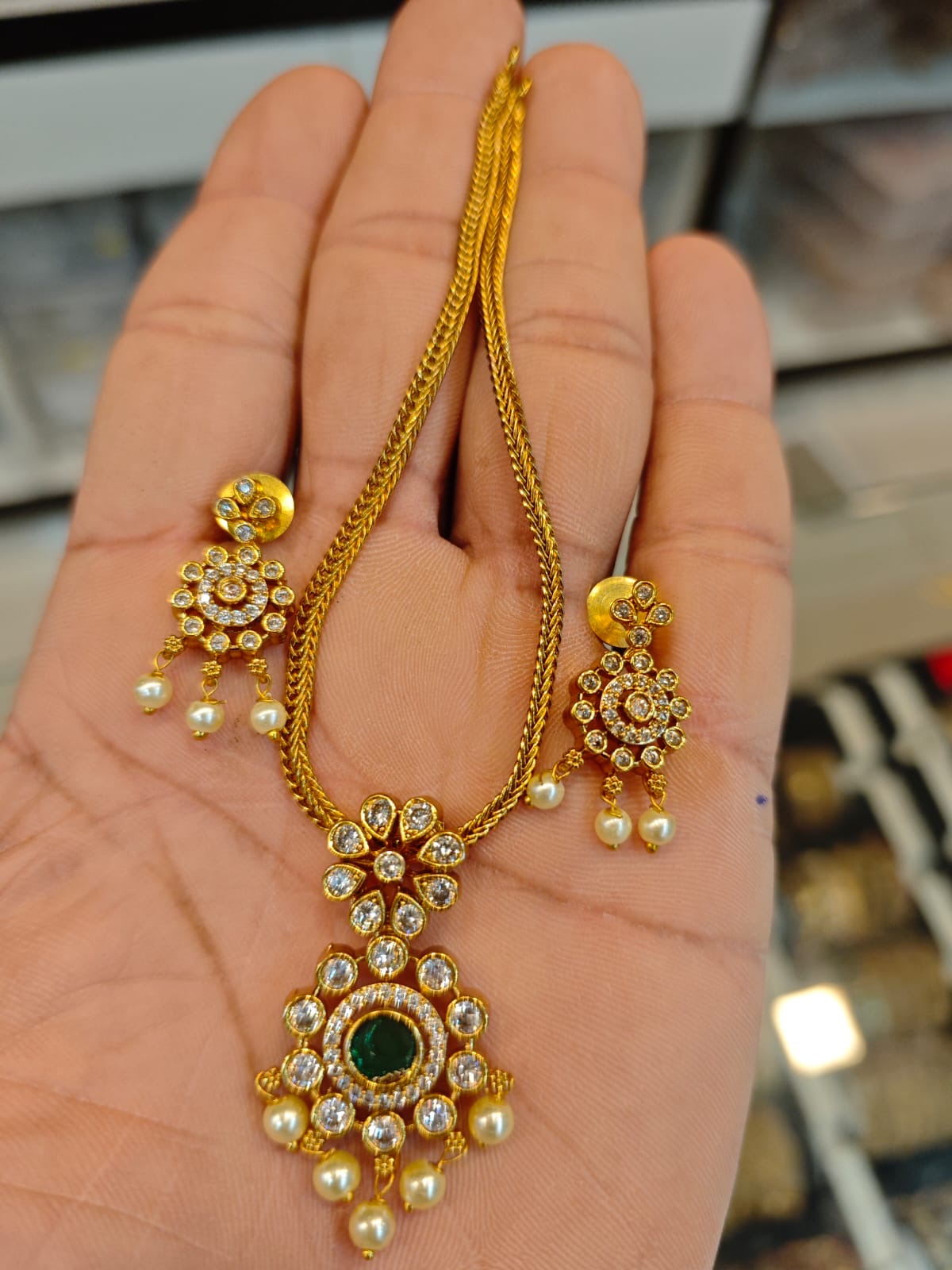 2grm gold polish necklace set.