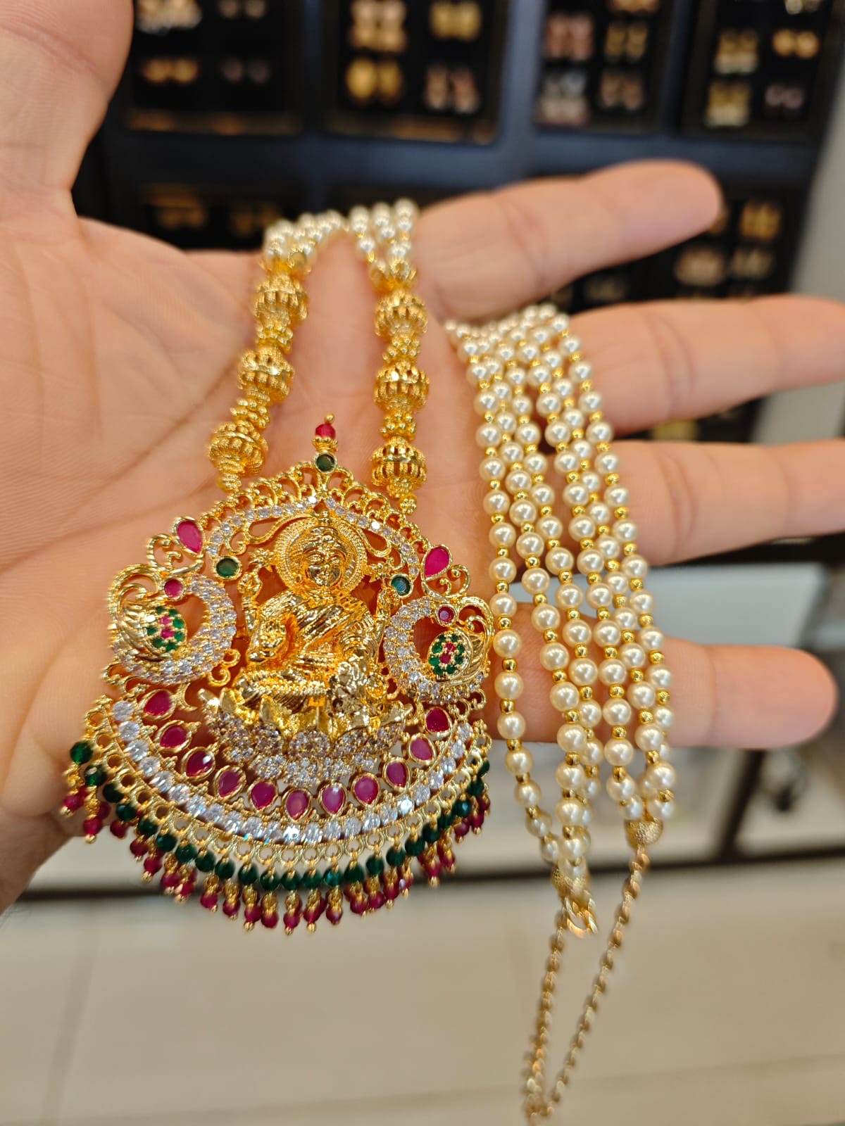 AD stones 1grm gold polish pendant with 3 layers pearl long haram set.