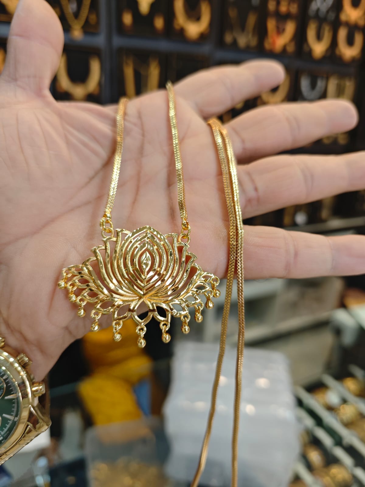 Panchaloha gold polish 2 years warranty pendant with 30 inches long snake design chain set.