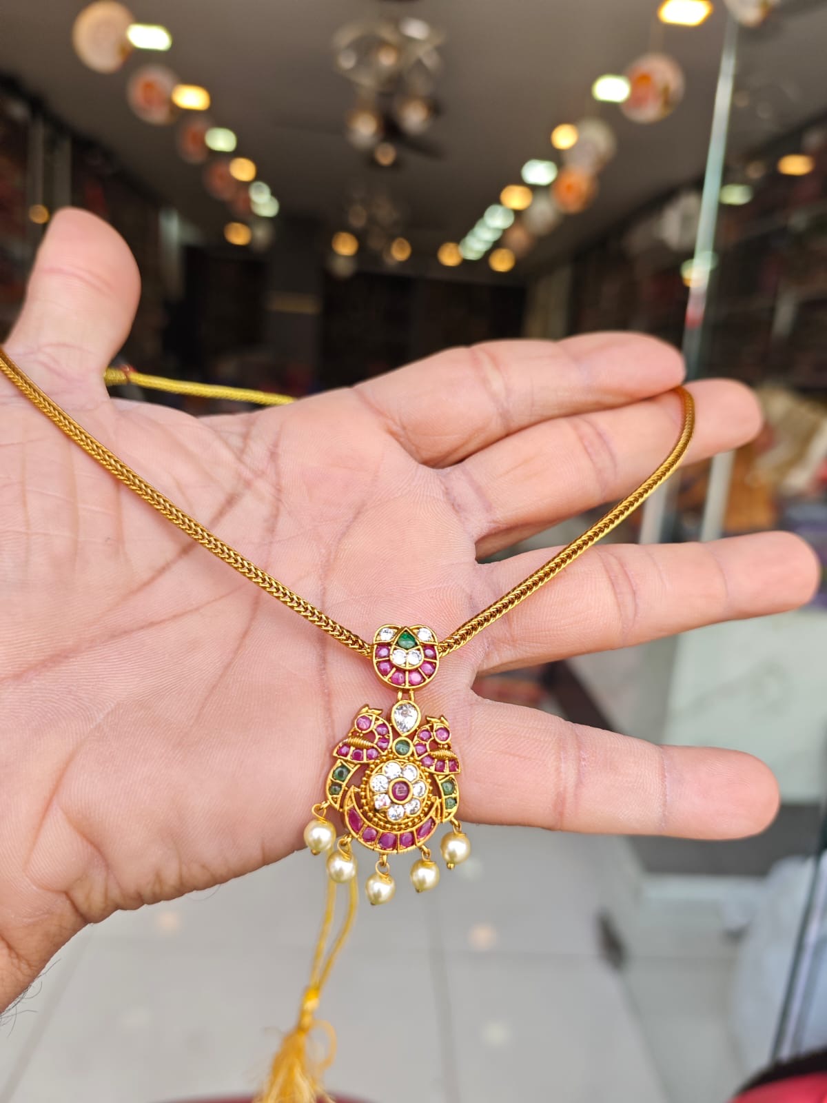 Kempu stones real gold polish 5 years warranty necklace set.