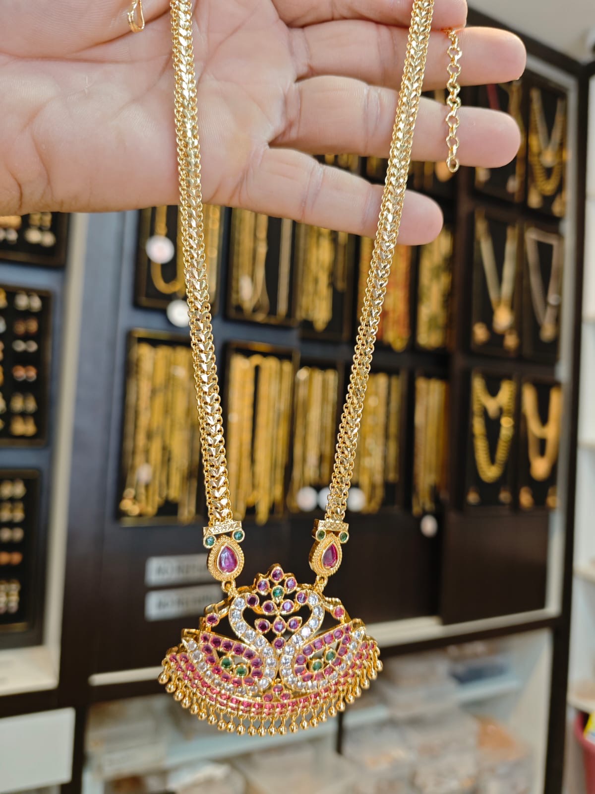 Panchaloha gold polish 5 years warranty pendant set.