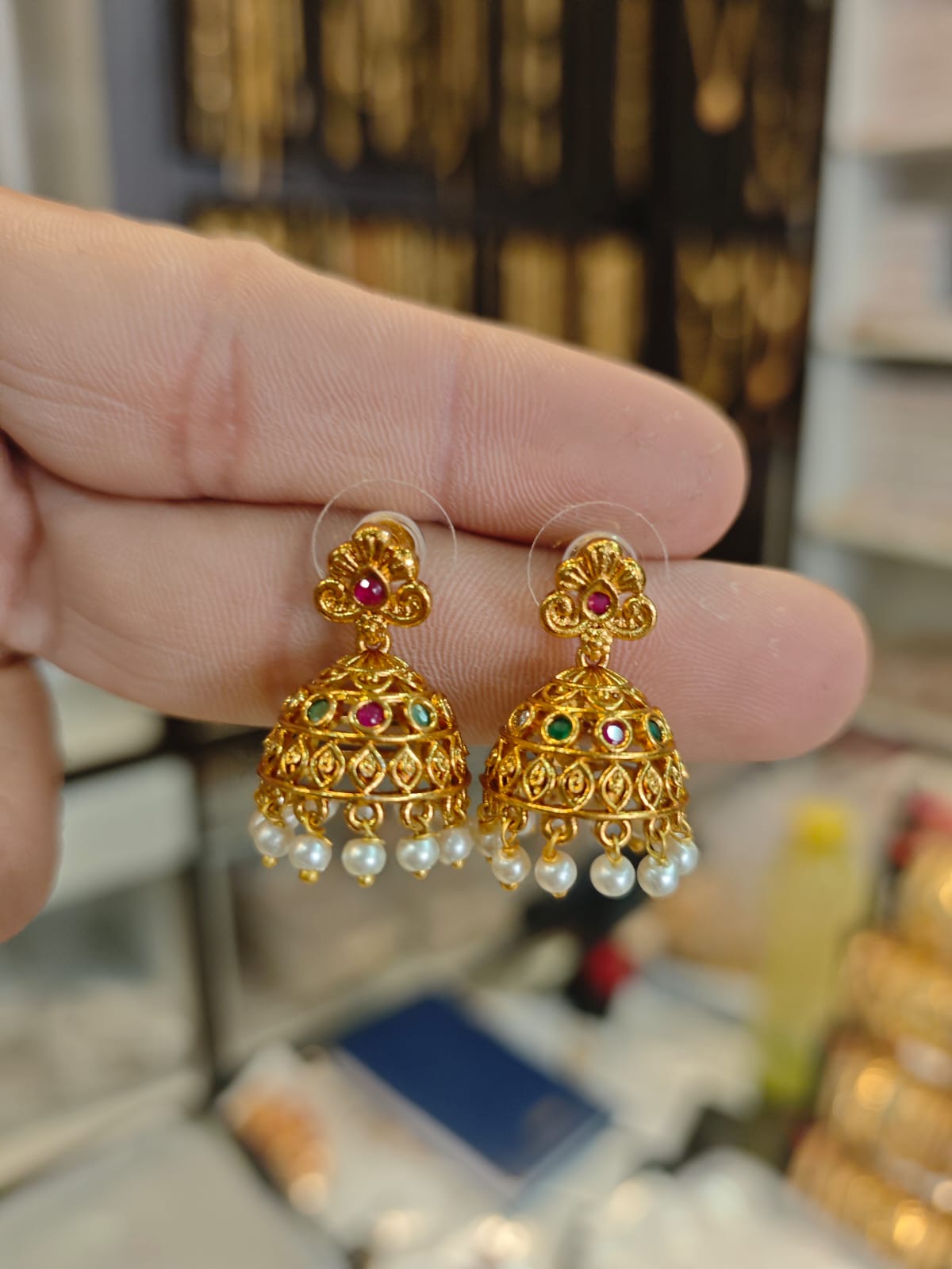 2grm gold polish 2 years warranty medium size jhumka set.
