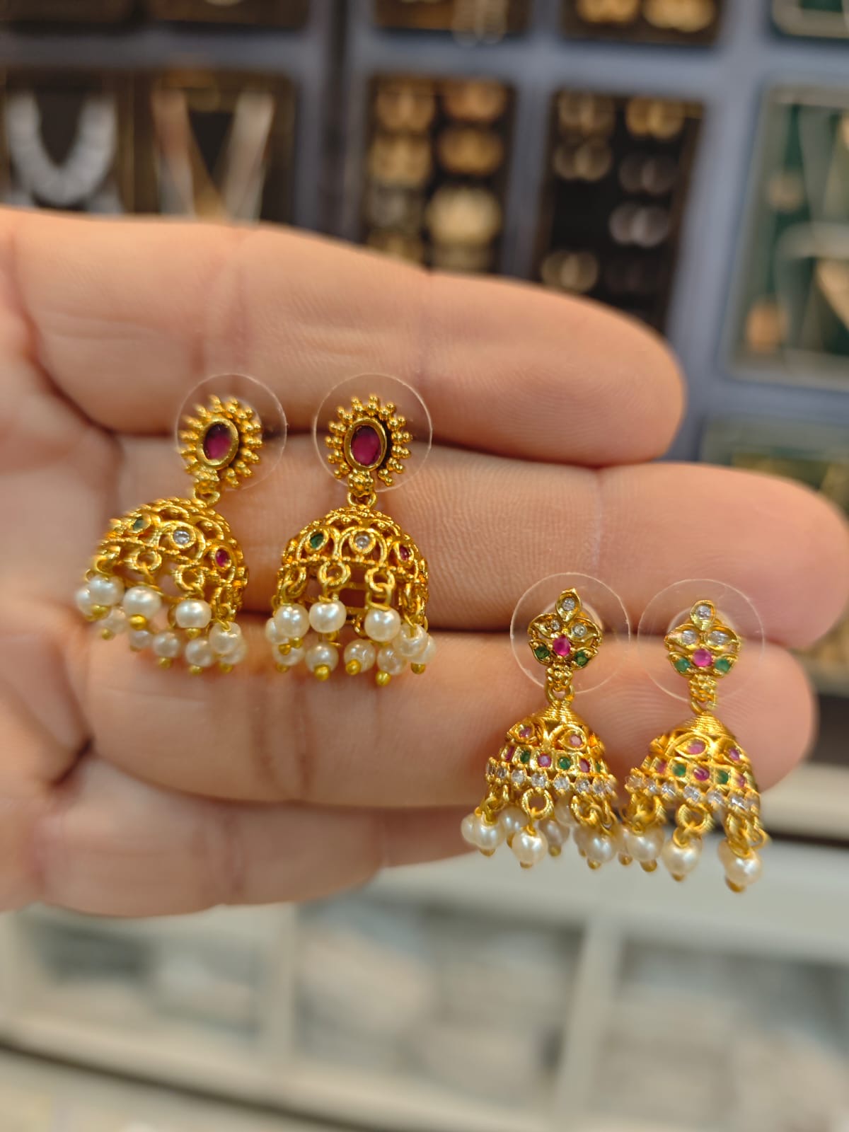 2grm gold polish 2 years warranty jhumka set.