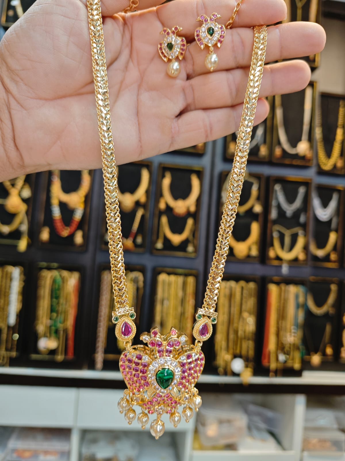 Panchaloha gold polish 5 years warranty long necklace set.