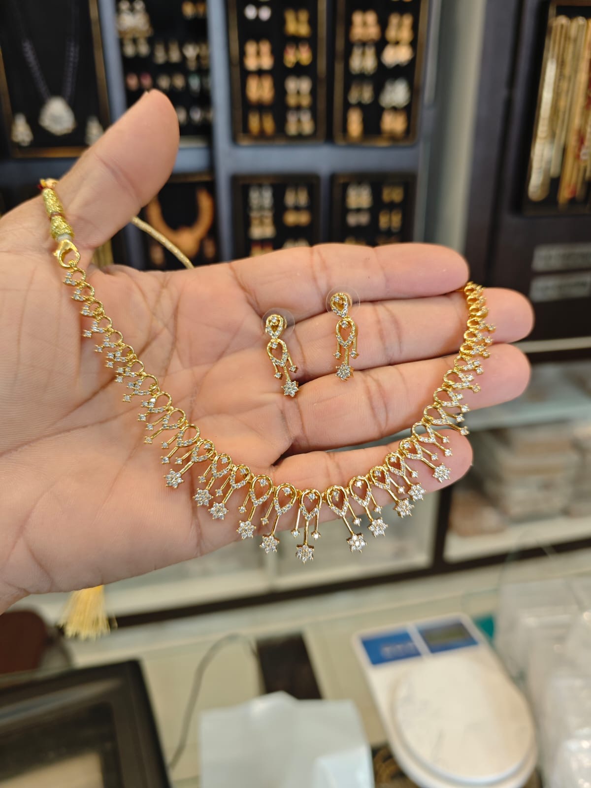 AD stones 1grm gold polish 2 years warranty necklace set.