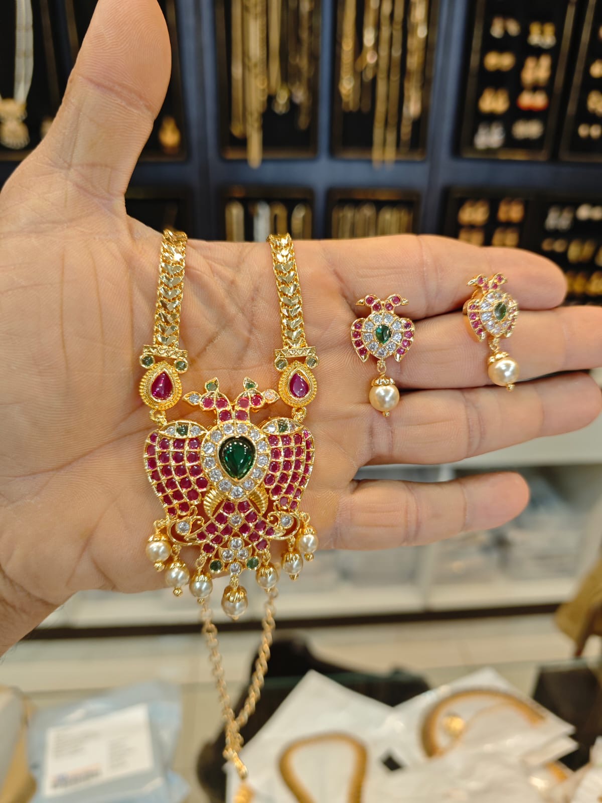 Panchaloha gold polish 5 years warranty jadayu stones gandaberunda necklace set.